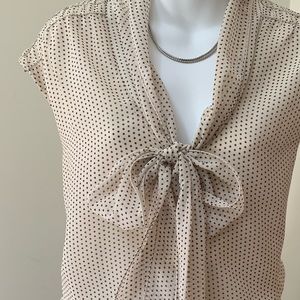 Polka dot blouse with tie